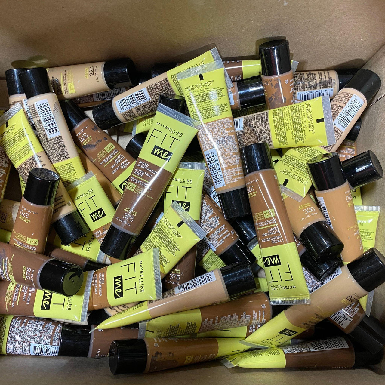 Maybelline Fit Me Assorted Tinted Moisturizer For All Skin Types With Aloe Vera 1OZ (50 Pcs Lot) - Discount Wholesalers Inc