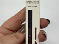 Revolution Bushy Brow Pen Flexible Brush Tip For Fine Detailing Ash Brow 0.5 ml 